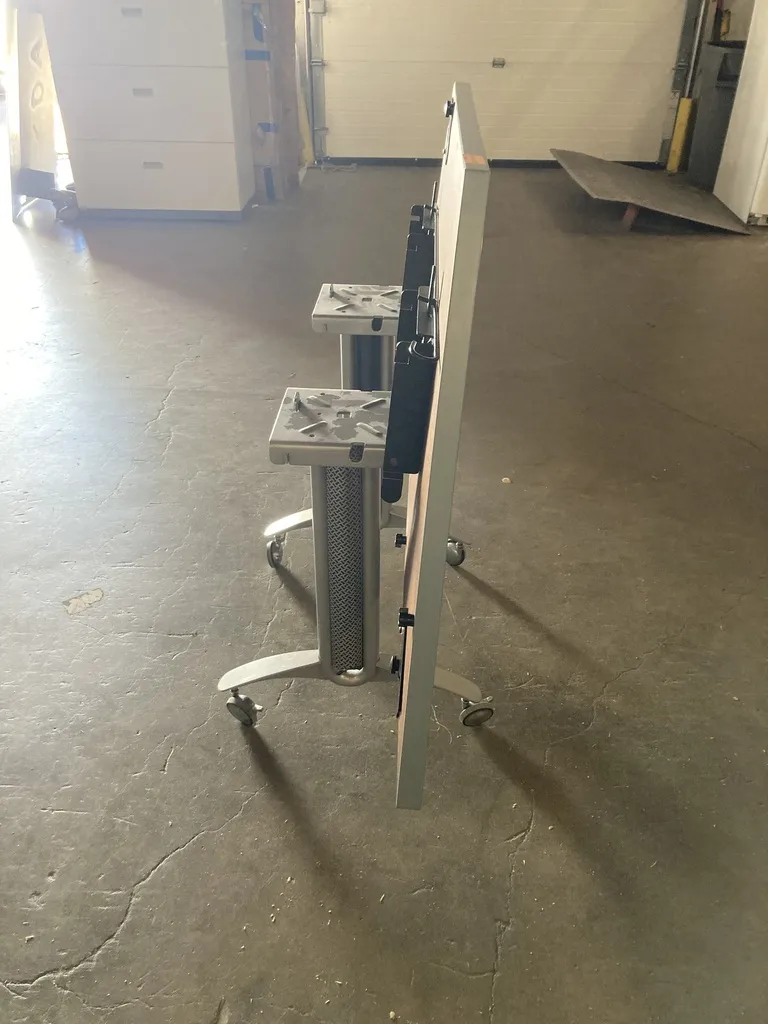 Versteel Fliptop Multi purpose Table, Mobile, Pattern Laminate top, Silver bases 30" x 60", Trapezoid