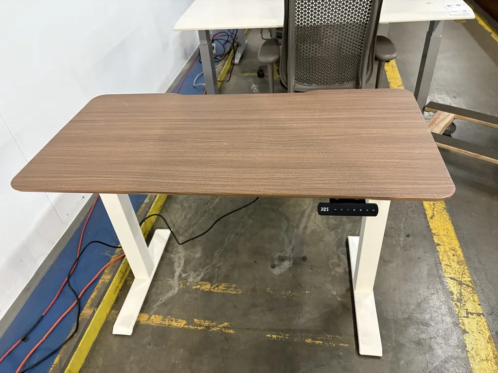 sit to stand / Height adjustable desk, 24" x 48", white chassis, Light Walnut top