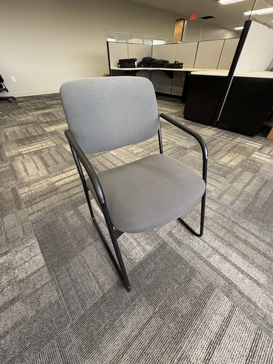Gray fabric side chair with black frame and arms 